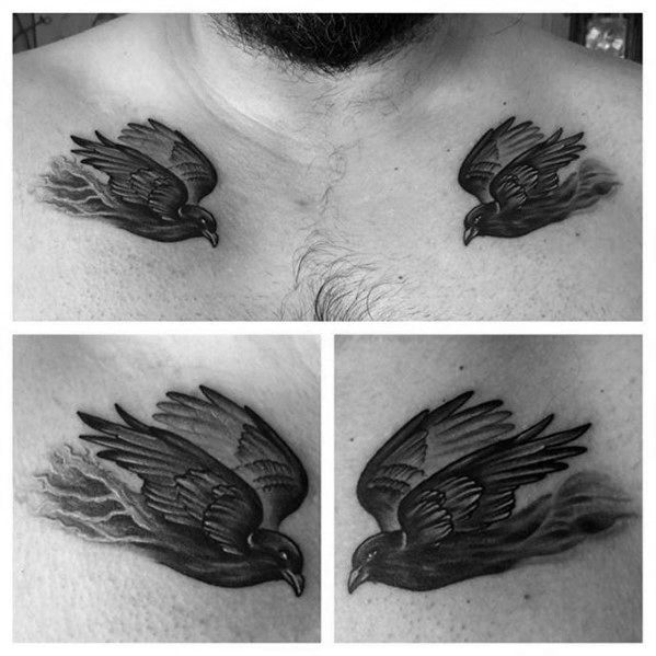 Black and grey chest tattoos of Huginn and Muninn flying outward with smoky trails behind their wings, positioned above each collarbone.