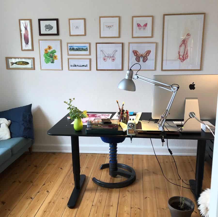 framed drawing wall art in home office