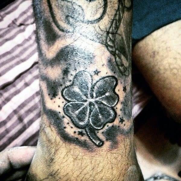 Old School Four Leaf Clover Black Ink Guys Wrist Tattoo