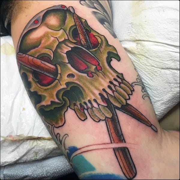 Old School Green Skull Drum Sticks Mens Bicep Tattoos
