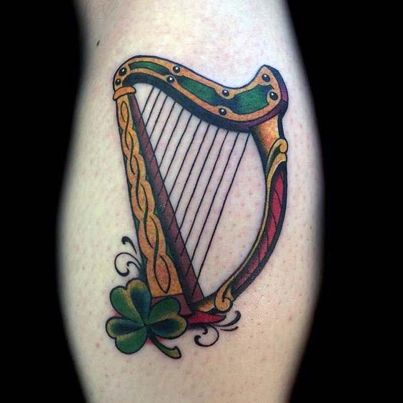 Old School Harp With Clover Irish Guys Arm Tattoo