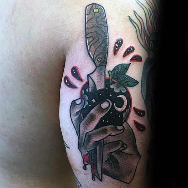Old School Mens Hand Holding Black Apple Back Of Arm Tattoo