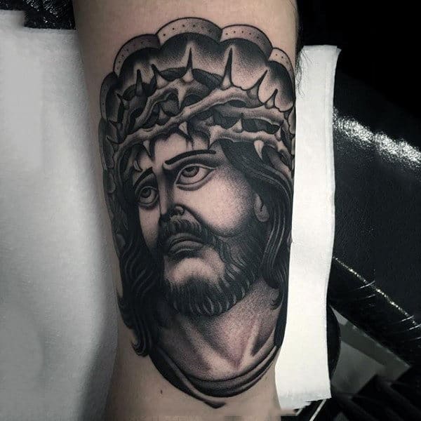 Old School Style Jesus Christ Tattoo On Mans Arm