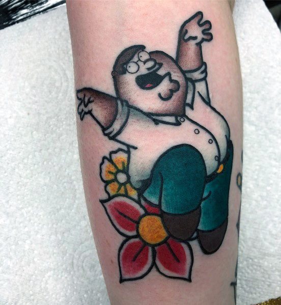 Tattoo of Peter Griffin from Family Guy joyfully jumping with arms raised, surrounded by colorful flowers, in a playful and vibrant design.