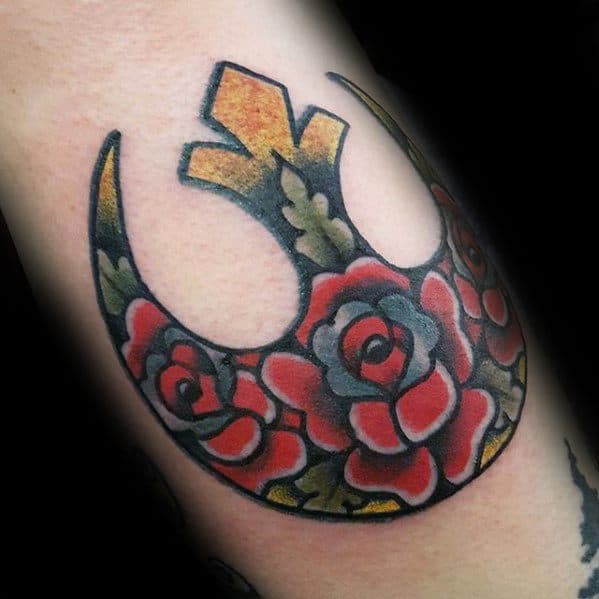 Tattoo of the Star Wars Rebel Alliance symbol filled with red roses and green leaves