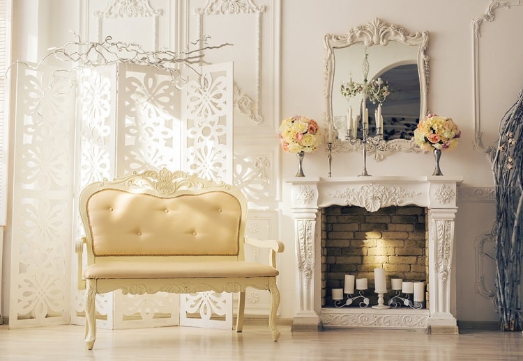 old stylish vintage bench seat and fireplace