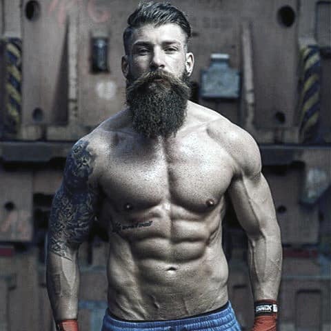 Shirtless Man with Undercut Hair and Long Beard