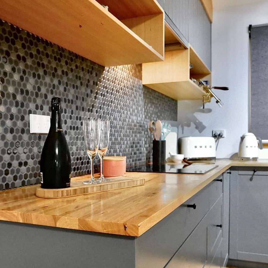 open shelving gray kitchen mosaic tile backsplash