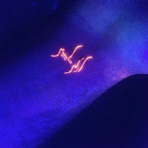 Orange Glow In The Dark Small Wrist Tattoos For Men