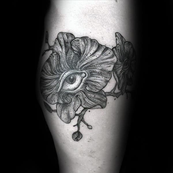Orchid Flower With Eye Mens Tattoo Designs On Leg