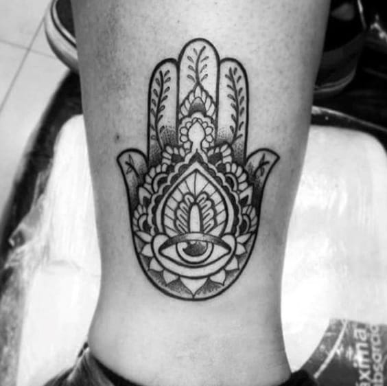 Ornate Hamsa Eye Male Lower Leg Tattoos