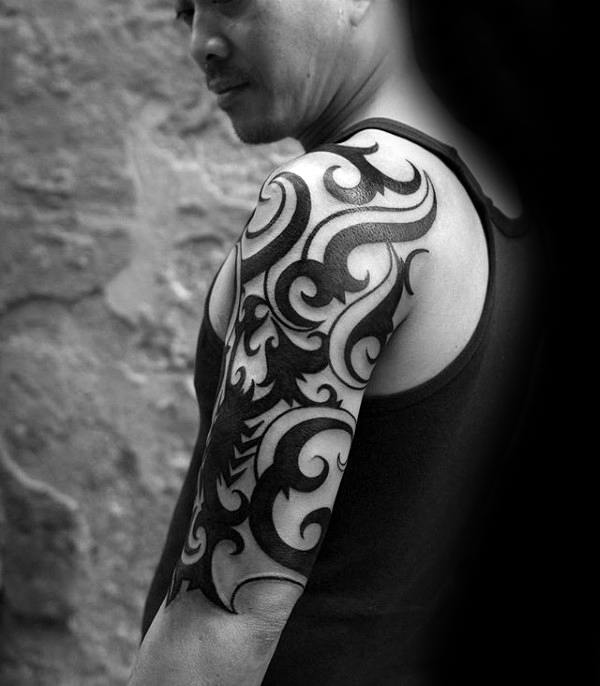 Ornate Male Tribal Half Sleeve Ideas For Tattoos