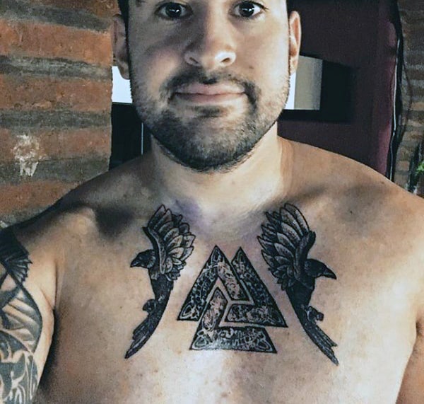 Ornate Male Valknut Upper Chest Tattoo With Bird Design