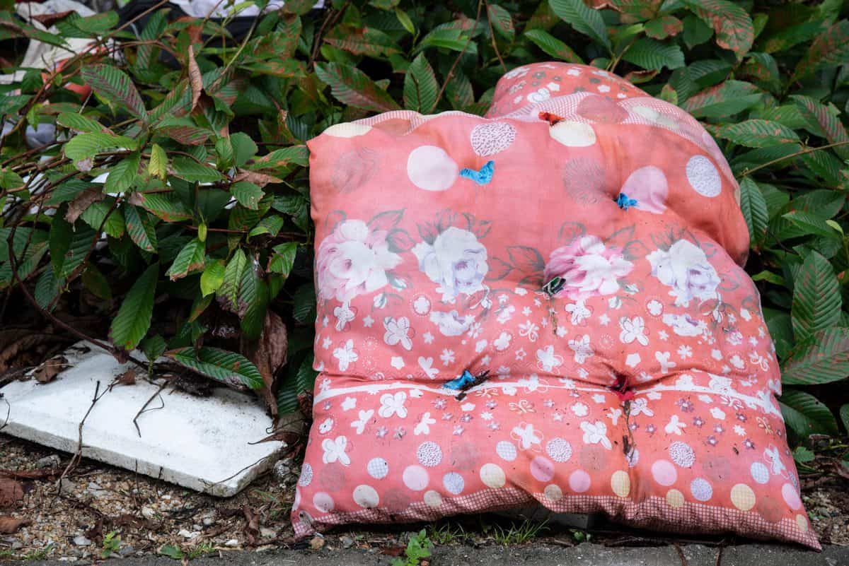 discarded flower print cushion 