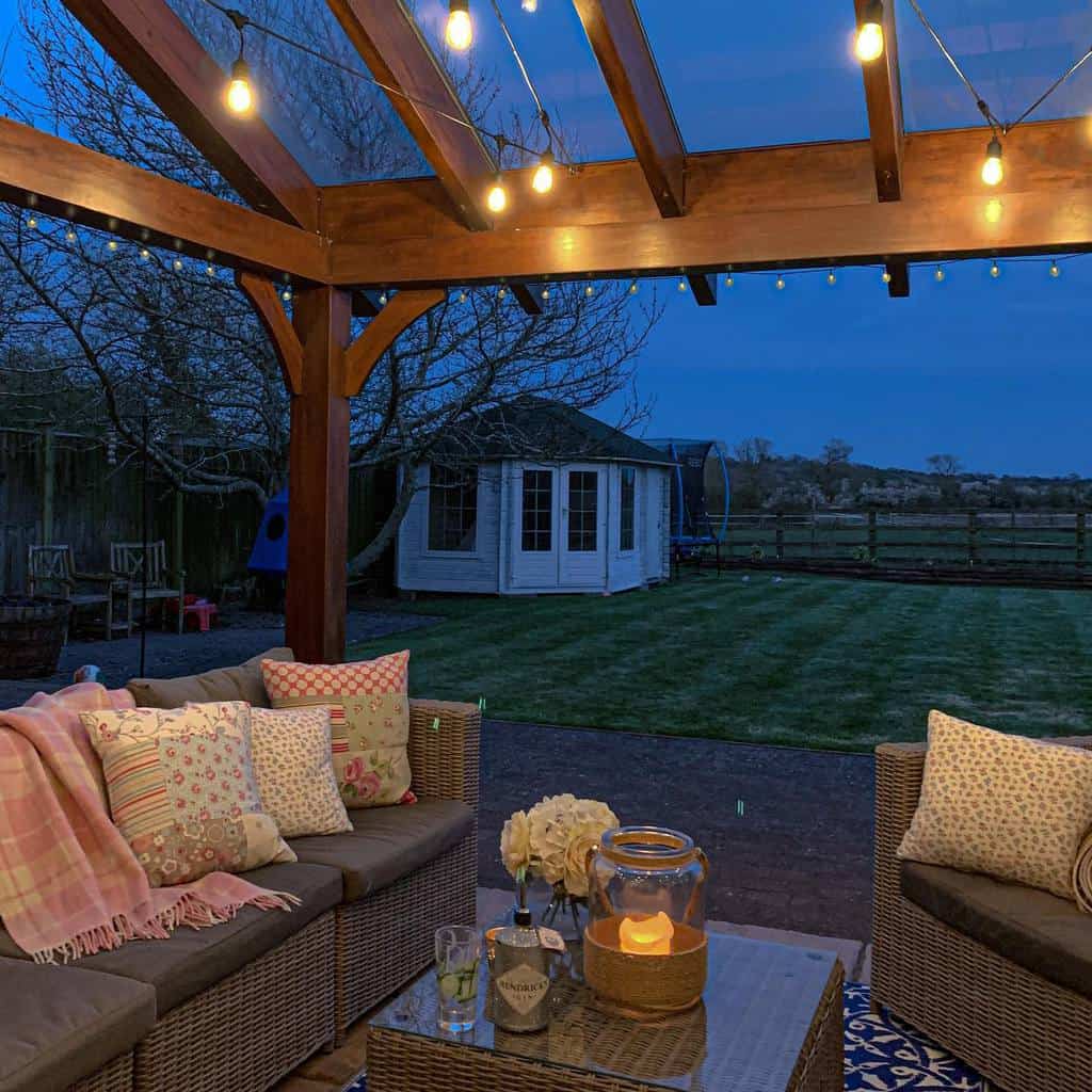 outdoor wood patio pergola with string lights 