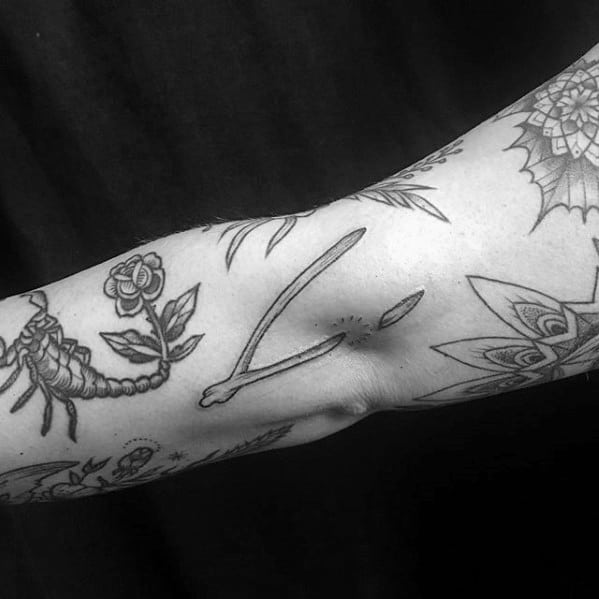 Outer Arm Guy With Wishbone Tattoo Design