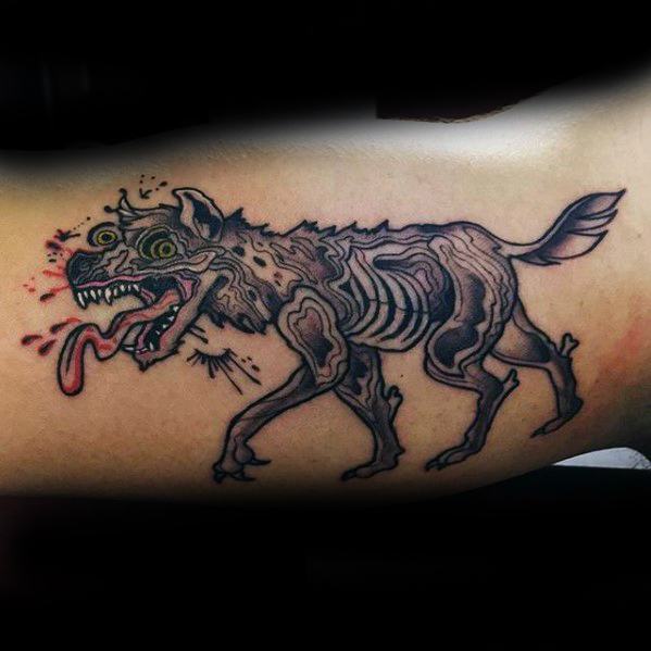 Cartoon-style zombie hyena tattoo with exposed ribs, wild yellow eyes, and a drooping tongue for a grotesque and chaotic look.