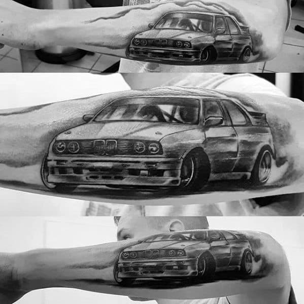 Realistic BMW E30 M3 tattoo on forearm, featuring bold shading and motion effects for a dynamic, high-performance look.