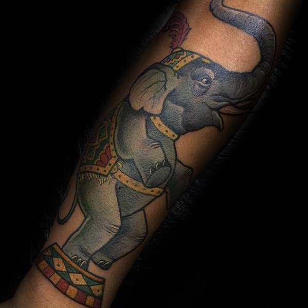 Outer Forearm Elephant Standing Up Male Circus Tattoo Design Inspiration