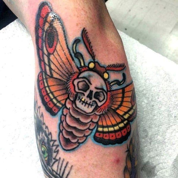 Outer Forearm Male Traditional Skull And Moth Tattoo Designs