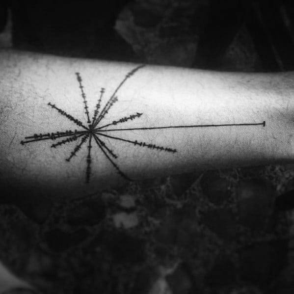 Black line tattoo on forearm with a radiating starburst design resembling a pulsar map