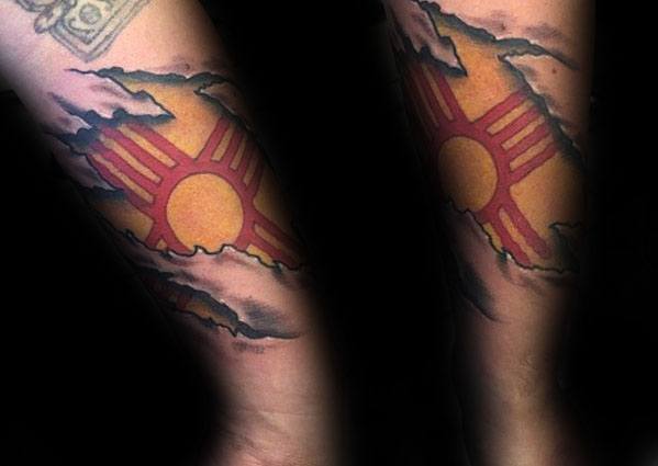 Outer Forearm Ripped Skin Flag Zia Tattoo Designs For Guys