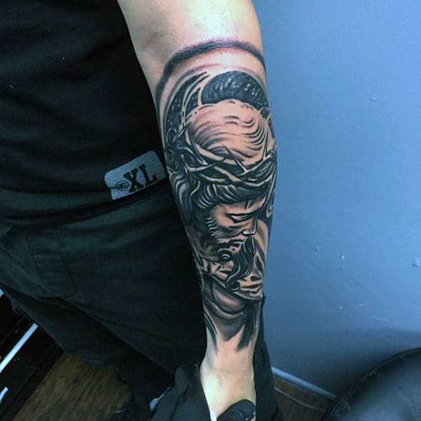 Outer Forearm Tattoo Of Jesus On Man