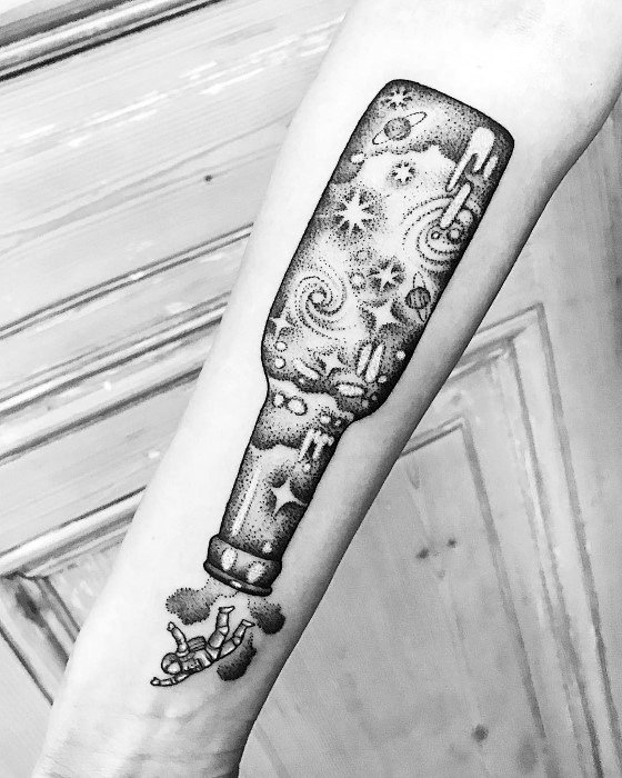 Whimsical blackwork tattoo of an upside-down beer bottle pouring out stars, galaxies, and cosmic elements, blending space and surrealism in a dotwork style.