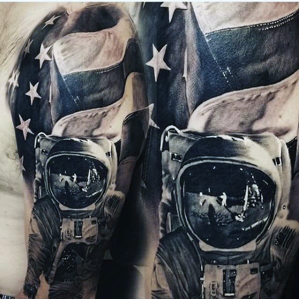 Tattoo of an astronaut with the American flag in the background