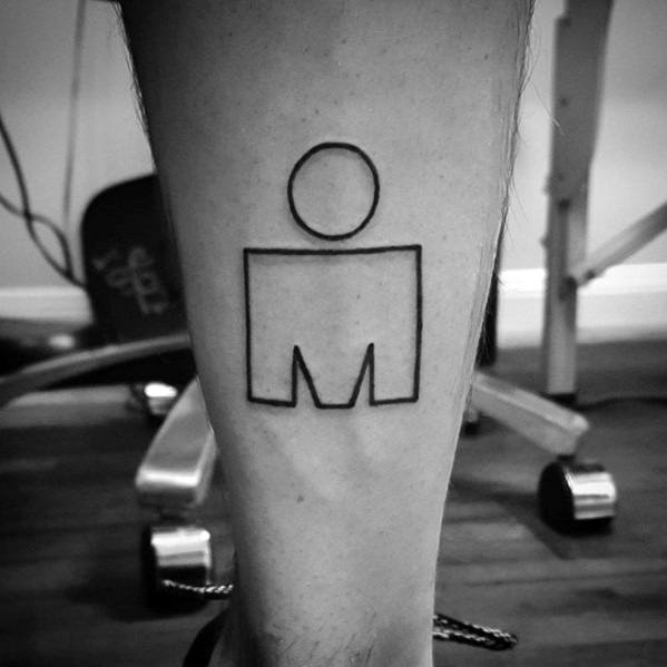 Minimalist Ironman logo tattoo in simple black outline, centered on the calf with clean lines and no additional elements.