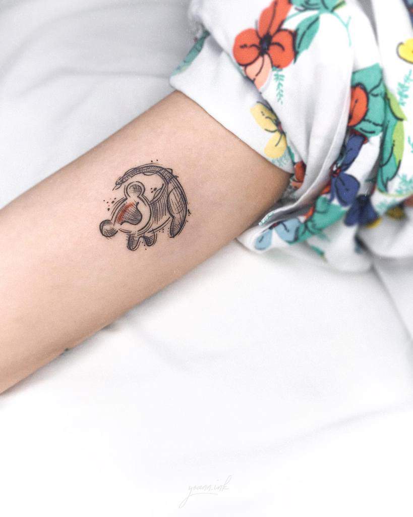 Minimalist tattoo of Simba in a playful pose, with delicate linework and subtle dot accents, capturing his cheerful and youthful spirit