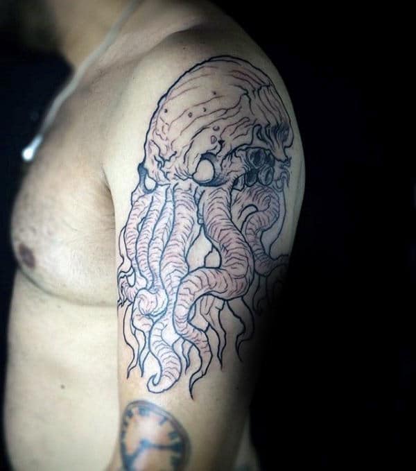 Outline Of Cthulhu Tattoo On Mans Arm