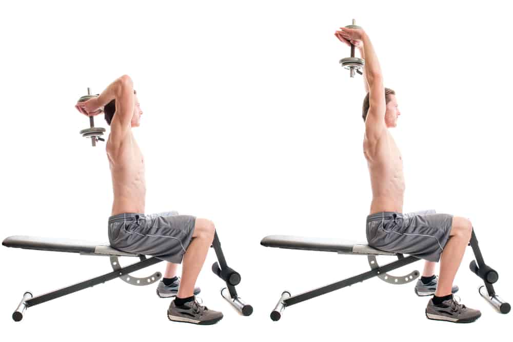 young man doing overhead triceps extension exercise