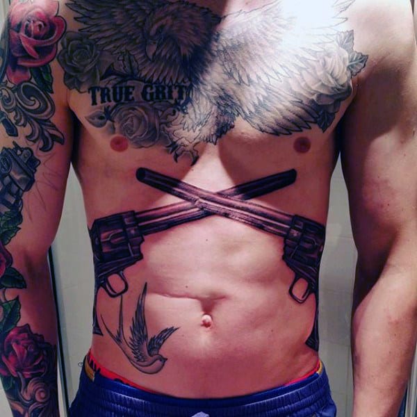 Overlapping Pistols Stomach Tattoos For Guys