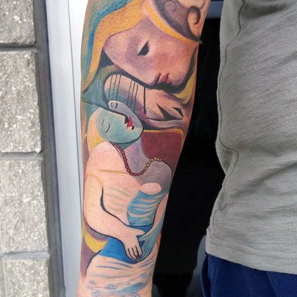Colorful forearm tattoo of Picasso’s *The Dream*, depicting a sleeping woman with soft curves and surreal facial features.