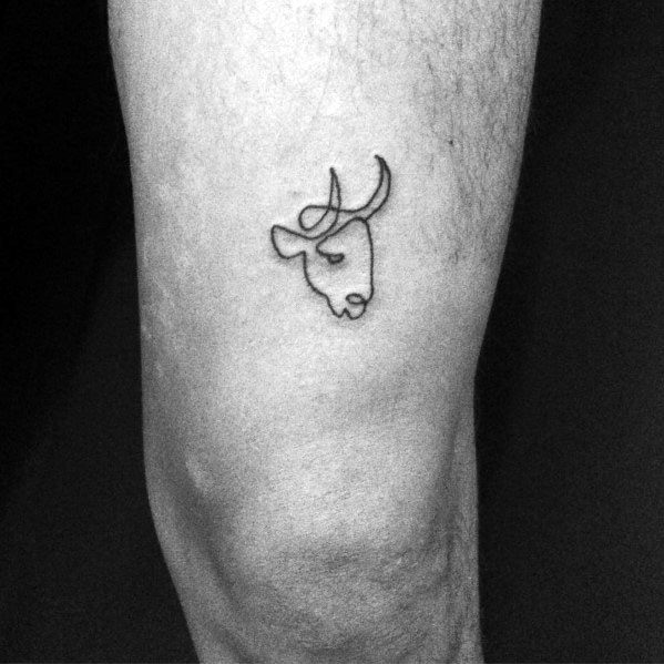 Small minimalist tattoo of a Picasso-style bull head, created with a continuous single line on the back of the arm.