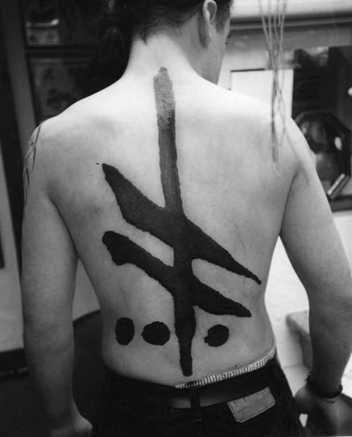 Paint Brush Stroke Blackwork Back Ogham Tattoo Design On Man