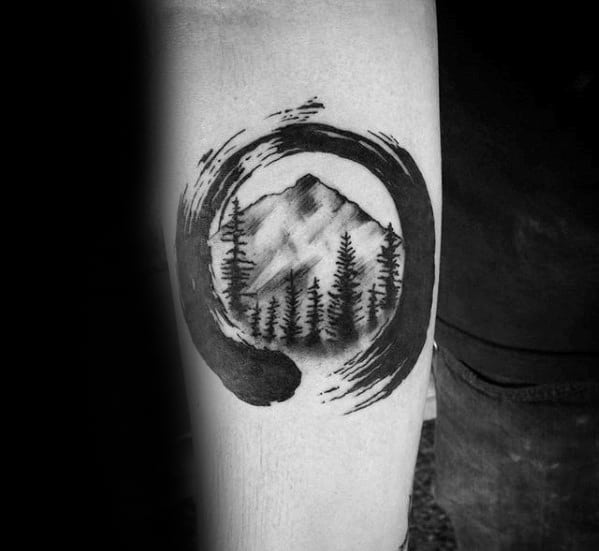 Paint Brush Stroke Circle With Trees And Mountains Guys Small Forearm Tattoo