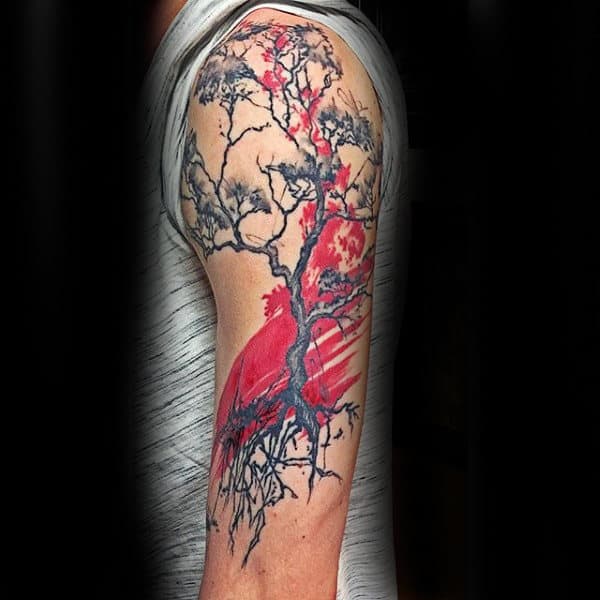 Abstract black and red tattoo of a tree with intricate branches and roots, featuring a bold red sun, blending nature and artistic expression.