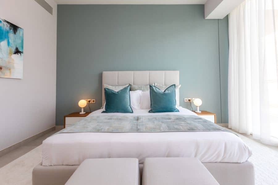blue accent wall in small master bedroom