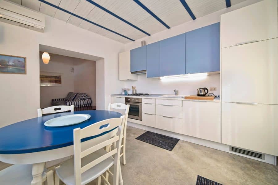 white and blue kitchen cabinets large space