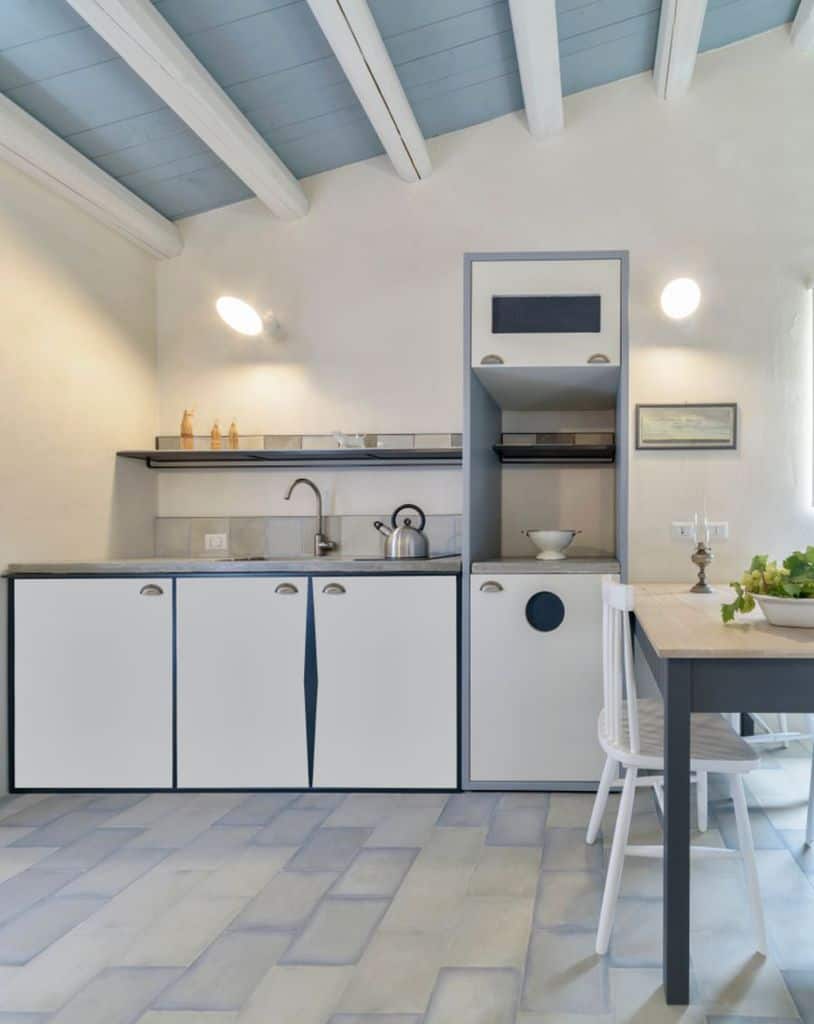 blue painted ceiling white cabinet kitchen