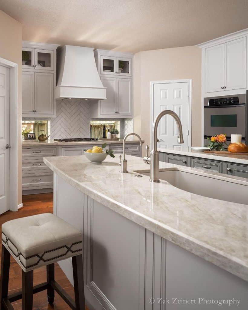 pink wall white cabinet kitchen subway tile backsplash