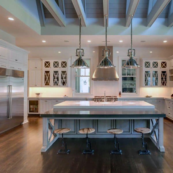large country style kitchen with with cabinets and breakfast bench with four stools