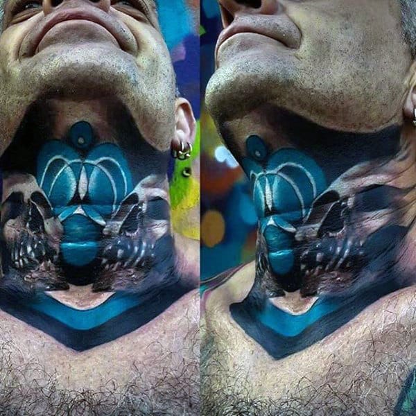 Throat tattoo featuring a futuristic blue geometric design with mirrored skulls, bold shading, and a striking illusion effect