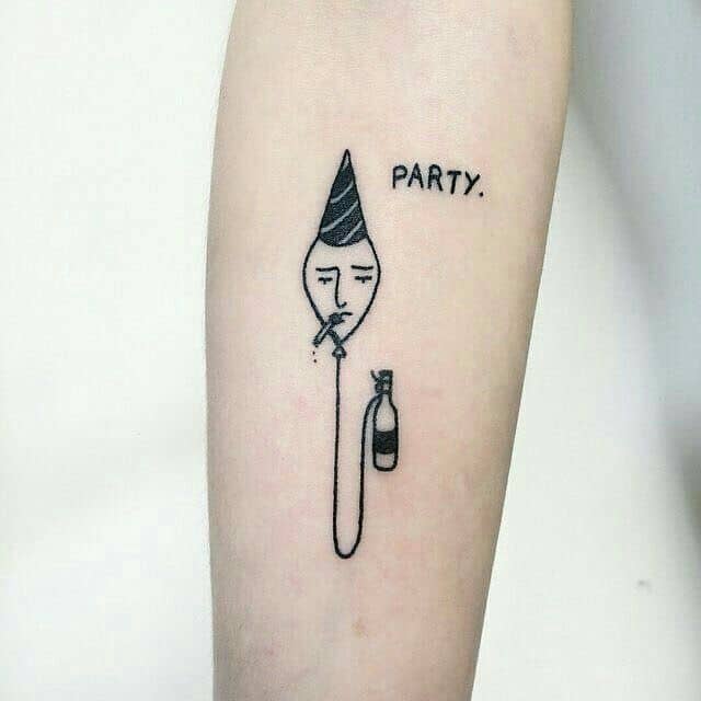 Funny tattoo of a spoon with a tired face, wearing a party hat, smoking, and holding a bottle. The word 'PARTY.' adds to the irony.