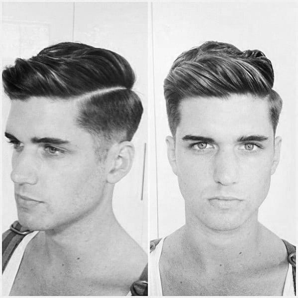 Sleek side part with a hard part and a clean fade
