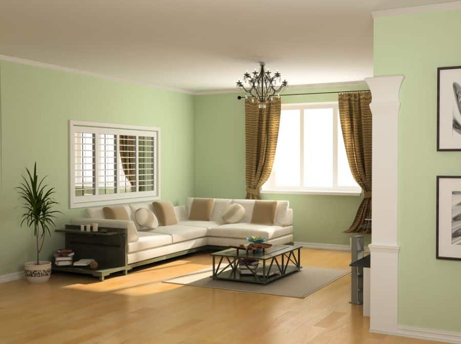 pastel green living room with white sofa