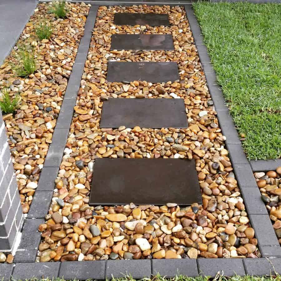 paver pathway loose stones grass