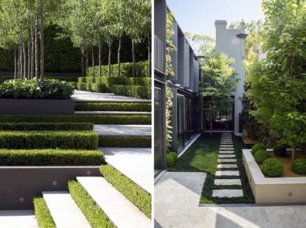 Terraced garden with neatly trimmed hedges and a modern courtyard featuring stone pathways.